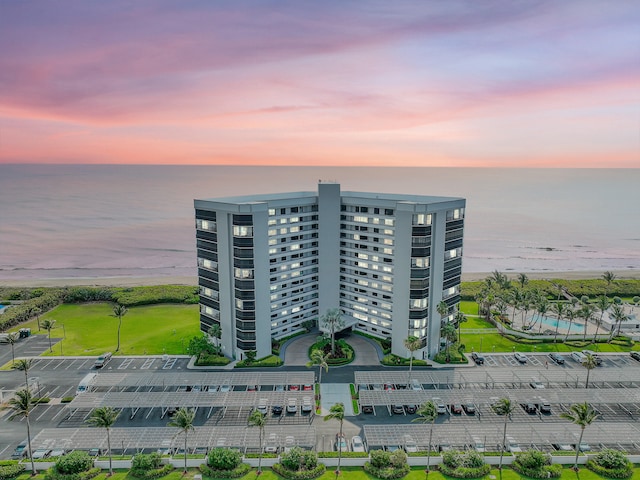 exterior space with a water view