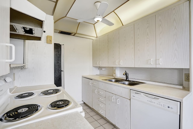 kitchen with dishwasher, ceiling fan, range, sink, and light tile floors