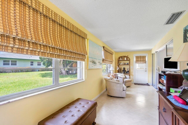 living room with a textured ceiling