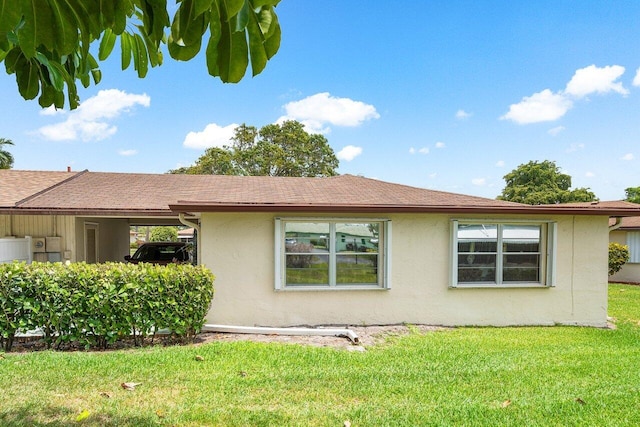 exterior space with a front yard