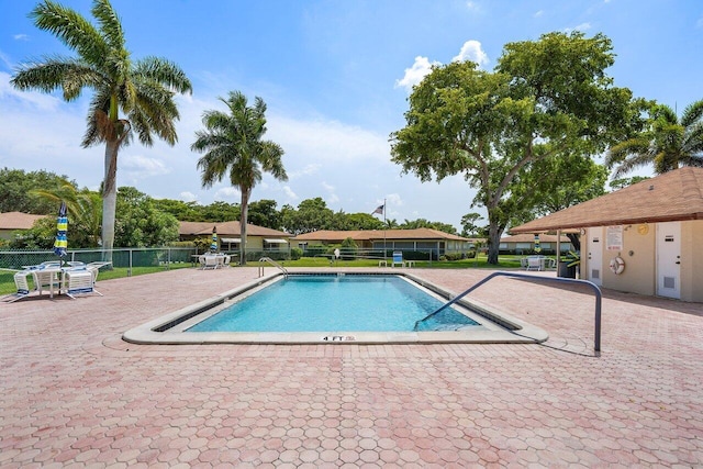 view of pool featuring a patio