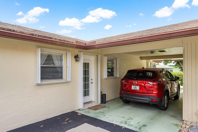 exterior space featuring a carport