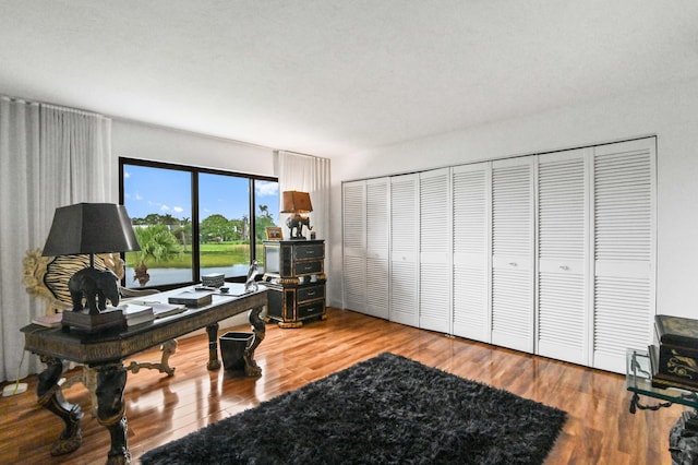 office space with light wood-type flooring