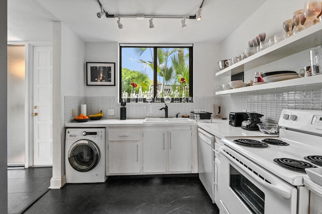 kitchen with open shelves, washer / clothes dryer, light countertops, white cabinets, and white appliances