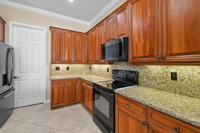 kitchen with light stone counters, crown molding, electric range, light tile patterned flooring, and stainless steel fridge