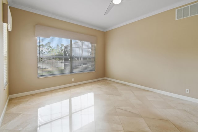 empty room featuring ceiling fan, ornamental molding, visible vents, and baseboards