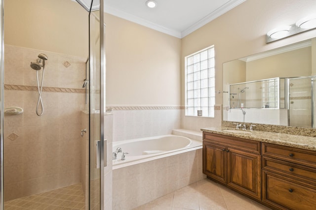 full bath with a garden tub, tile patterned flooring, ornamental molding, and a shower stall