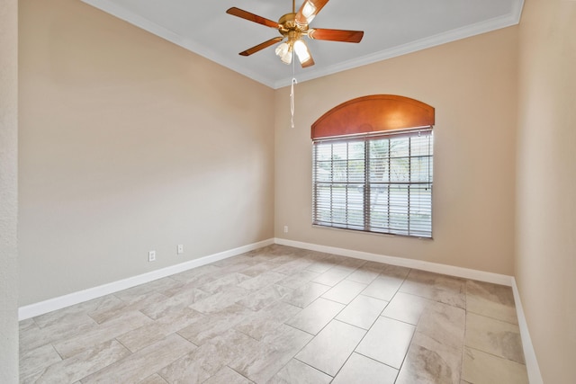 spare room with baseboards, a ceiling fan, and crown molding