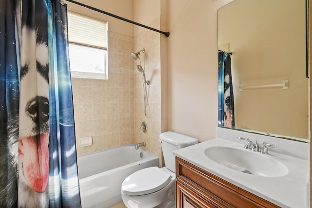 bathroom featuring toilet, shower / tub combo, and vanity