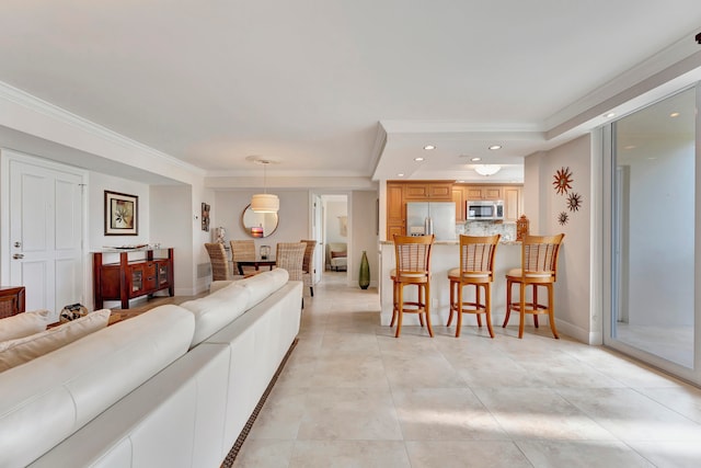 tiled living room featuring ornamental molding