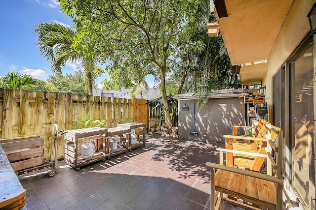 view of patio / terrace featuring fence