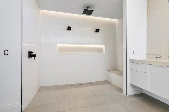 bathroom with vanity and walk in shower