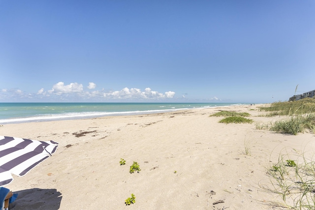 property view of water with a beach view