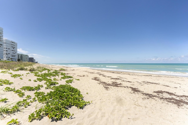 property view of water with a beach view