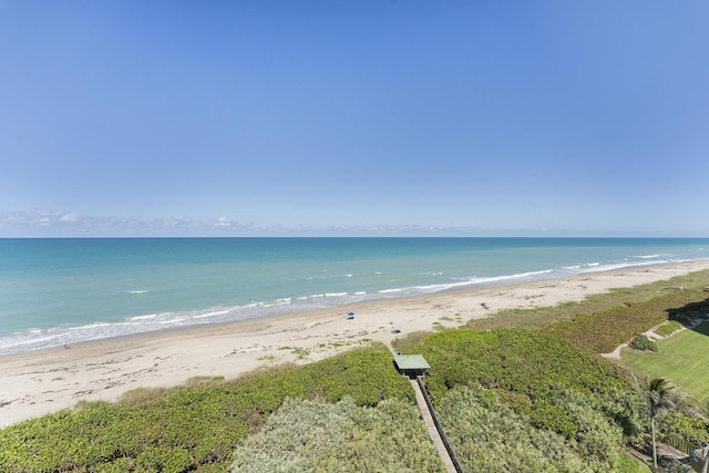 view of water feature with a beach view