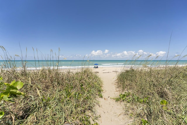 water view featuring a beach view