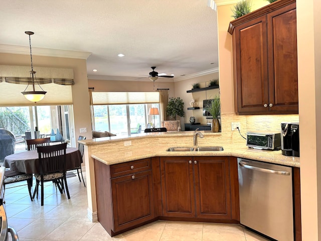 kitchen featuring sink, dishwasher, light tile floors, and ornamental molding