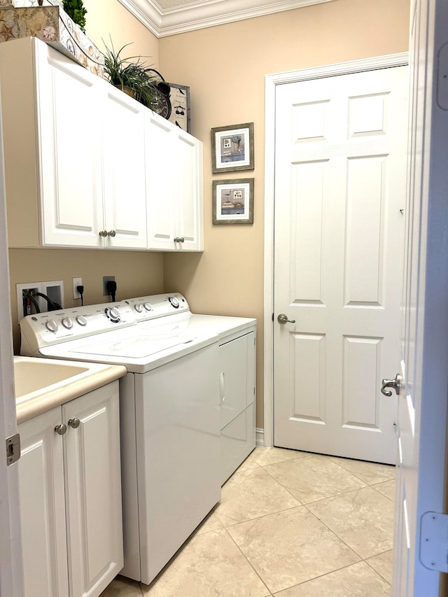 laundry room with cabinets, light tile flooring, electric dryer hookup, separate washer and dryer, and ornamental molding