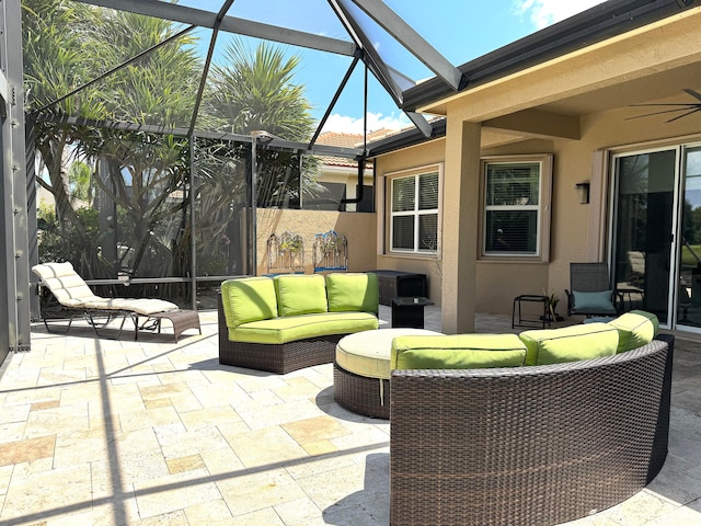 sunroom / solarium with ceiling fan