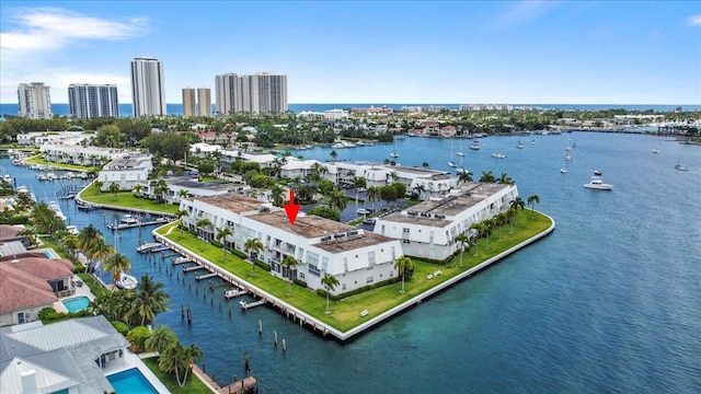 birds eye view of property featuring a water view