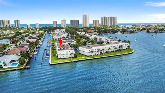 birds eye view of property featuring a water view