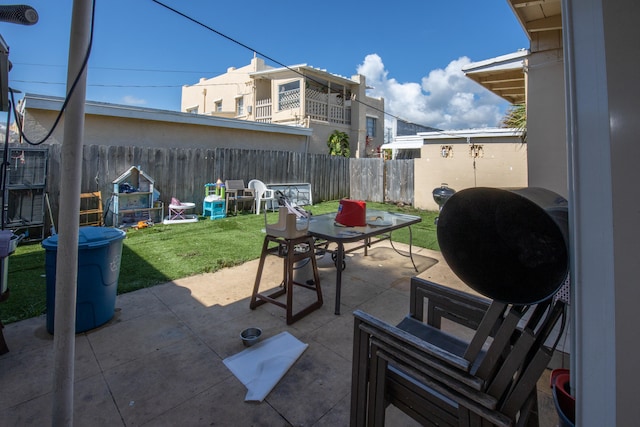 view of terrace featuring a balcony and a trampoline