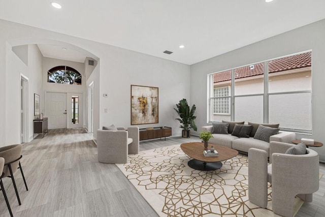 living room with light hardwood / wood-style flooring