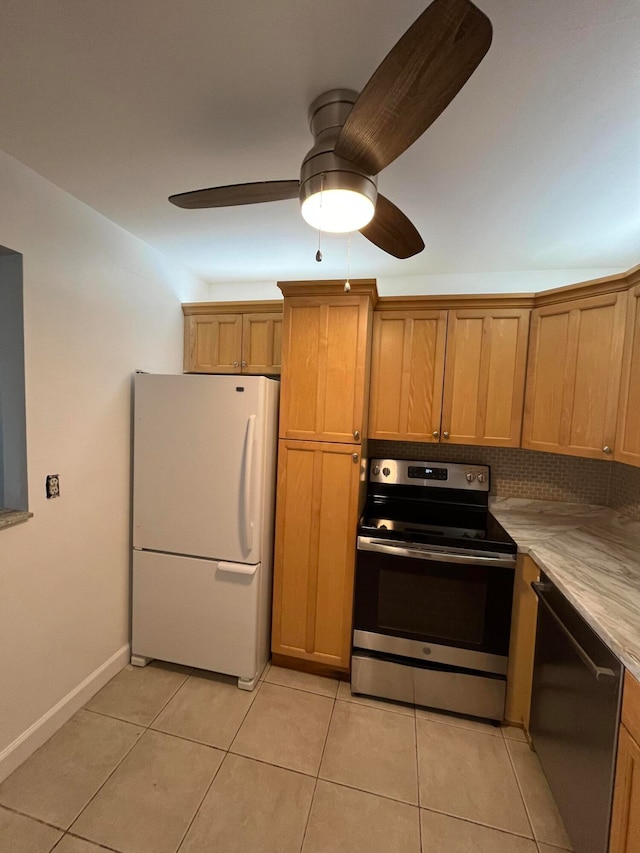 kitchen with ceiling fan, white fridge, electric stove, and light tile flooring