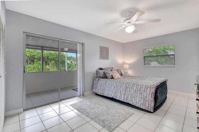 tiled bedroom with ceiling fan