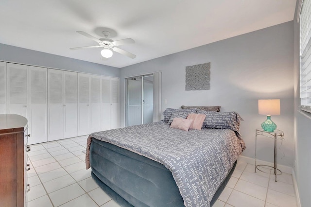 tiled bedroom with ceiling fan