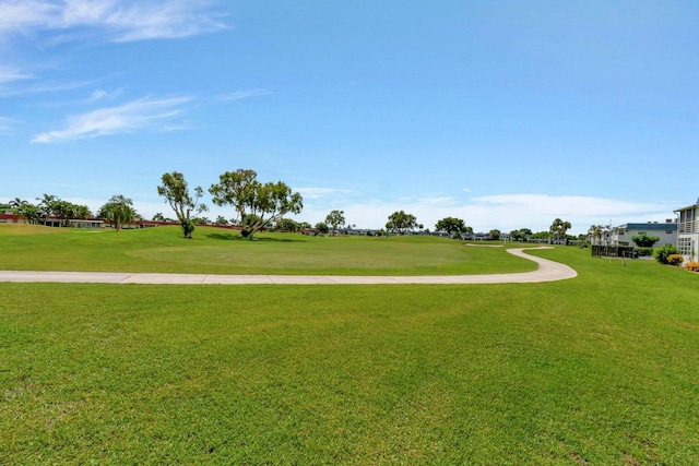 surrounding community featuring a lawn