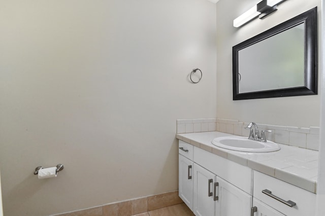 bathroom featuring tile patterned floors and vanity