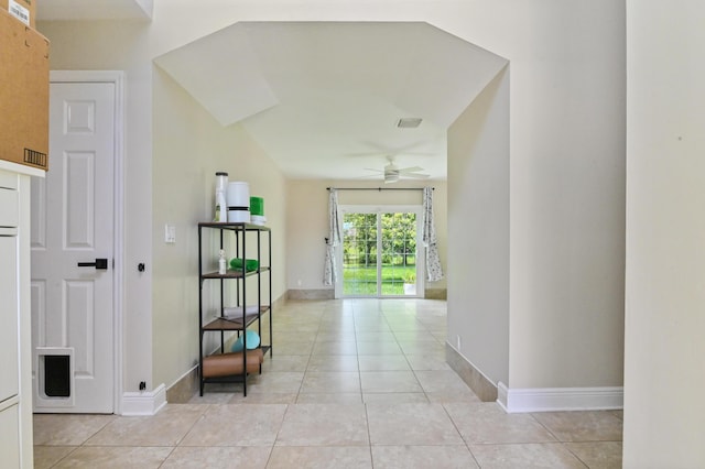 hallway featuring light tile patterned flooring