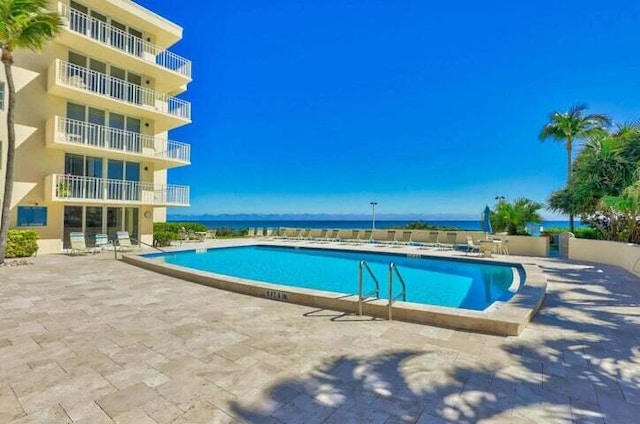 view of pool featuring a patio area