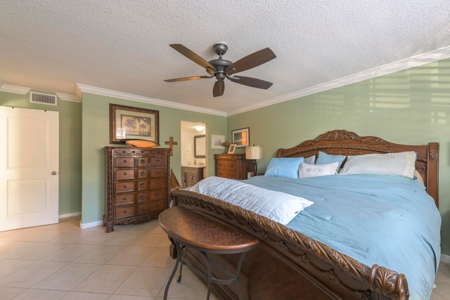 tiled bedroom featuring crown molding, a textured ceiling, ensuite bathroom, and ceiling fan