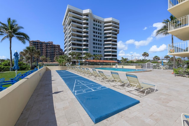 view of property's community with a swimming pool