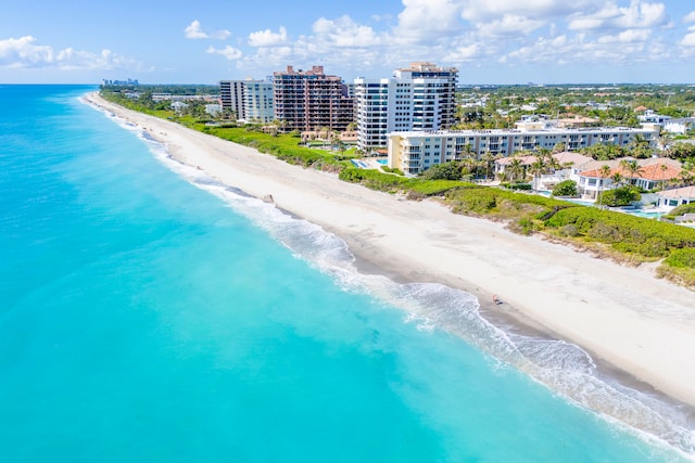 aerial view with a beach view and a water view