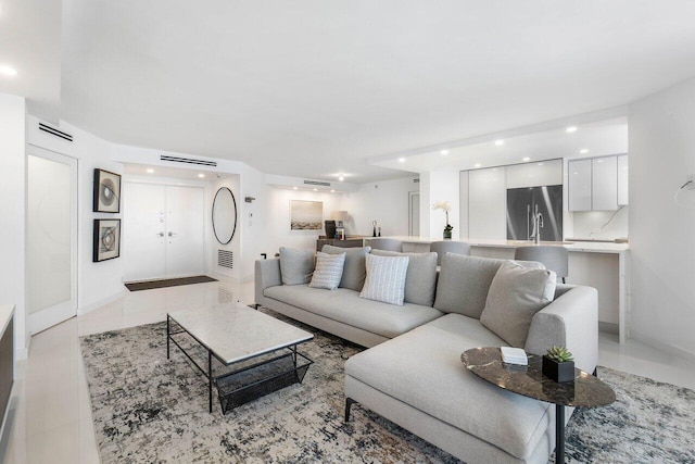 living room with light tile floors