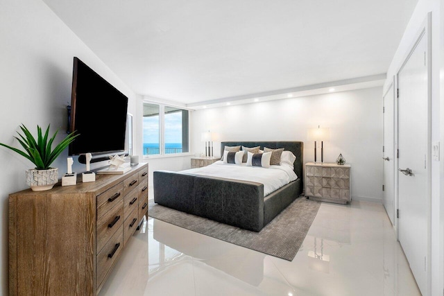 bedroom featuring light tile flooring