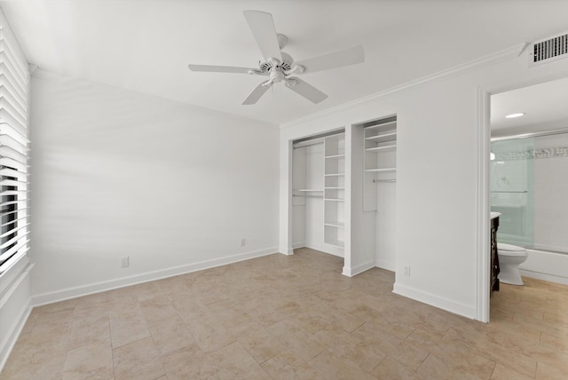 unfurnished bedroom featuring connected bathroom, a closet, ceiling fan, and light tile floors