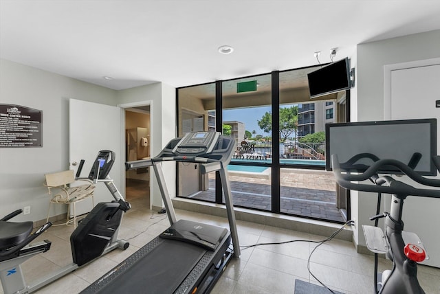 exercise area with tile floors