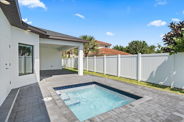 view of pool featuring a patio