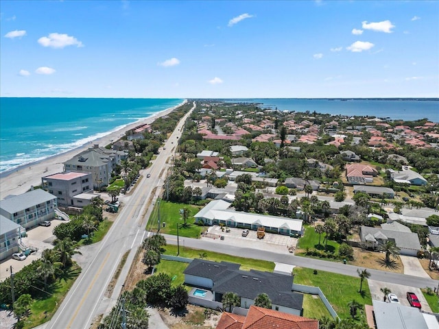 aerial view featuring a water view and a view of the beach