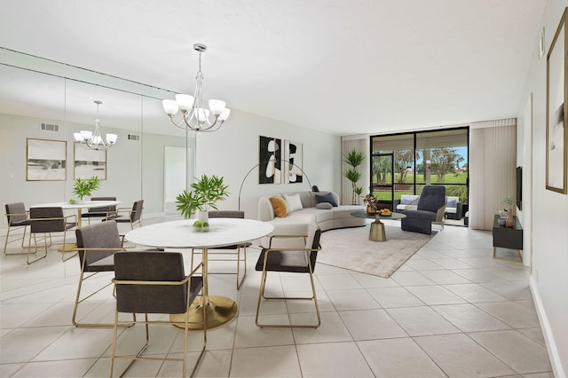 tiled dining room with a notable chandelier and expansive windows