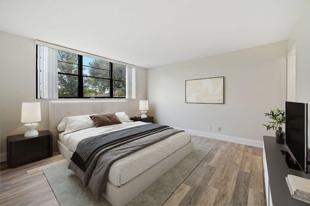 bedroom featuring light hardwood / wood-style flooring