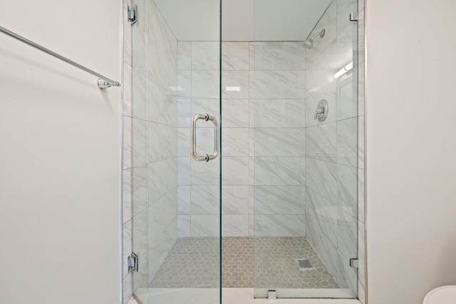 bathroom with an enclosed shower