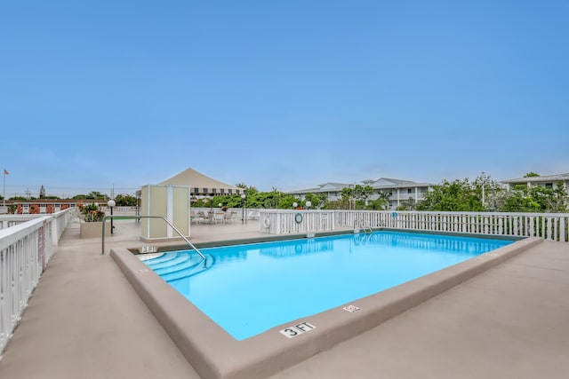 view of pool with a patio area