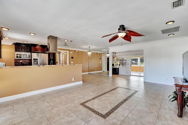 interior space with ceiling fan and ornamental molding