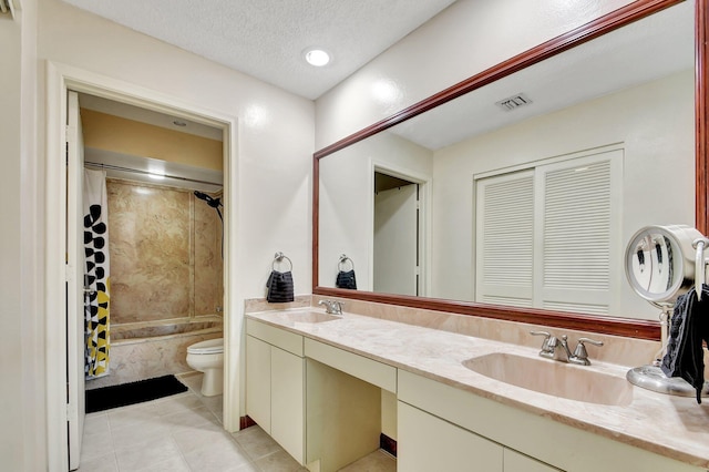 full bathroom with shower / bath combination with curtain, tile patterned floors, vanity, a textured ceiling, and toilet