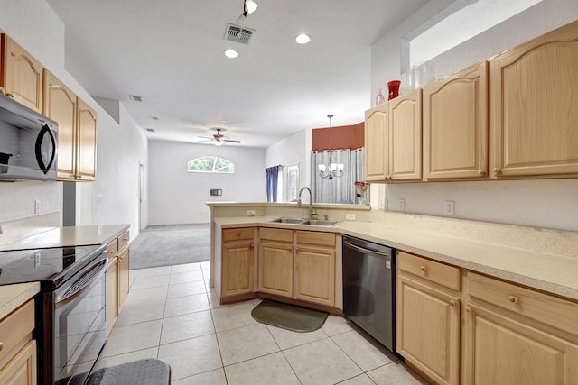 kitchen featuring light tile patterned flooring, kitchen peninsula, ceiling fan, appliances with stainless steel finishes, and sink